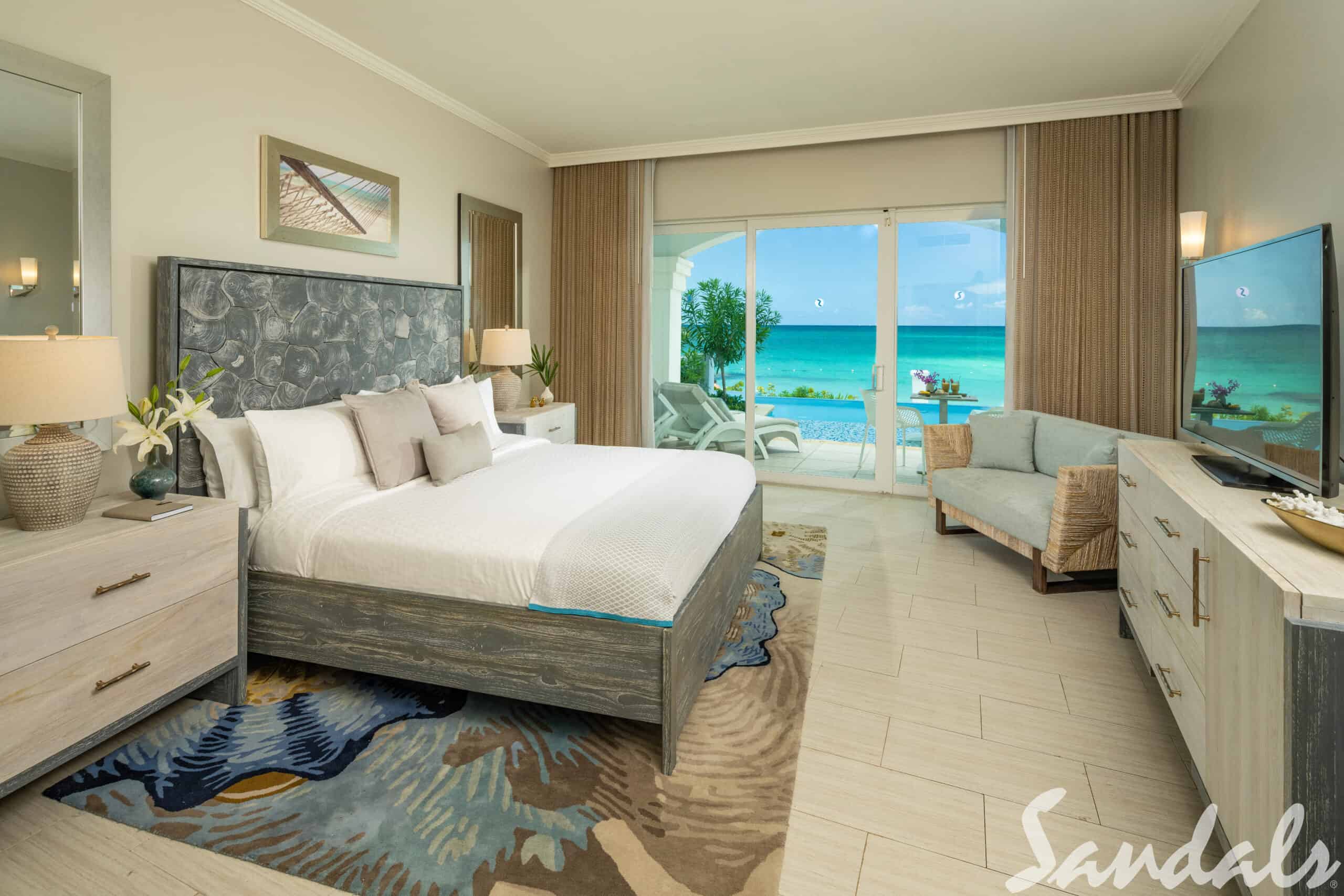 16 Best All-Inclusive Resorts in the Caribbean—Our Review 43 East Bay Beachfront Swim-up Butler Suite - Bedroom