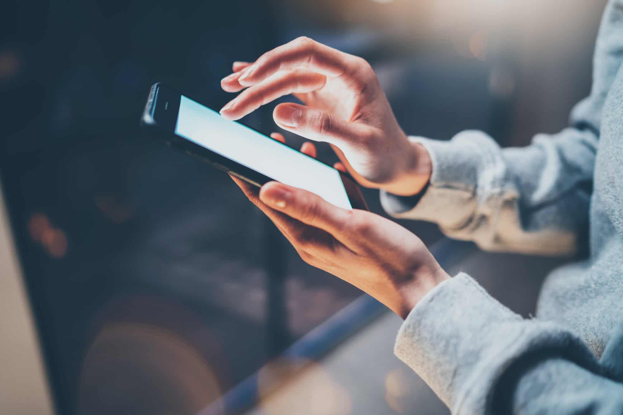 12 Travel Hacks Every Senior Needs to Know in 2025 5 Female finger pointing on screen of phone