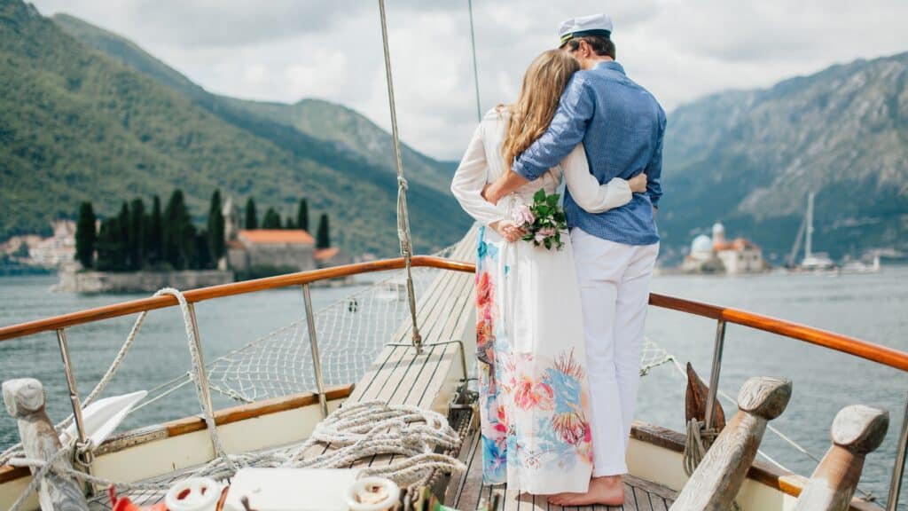 Cruise vs All-Inclusive Resort for Honeymoon Bliss: A Guide 2 Honeymoon Couple Travel on Yacht