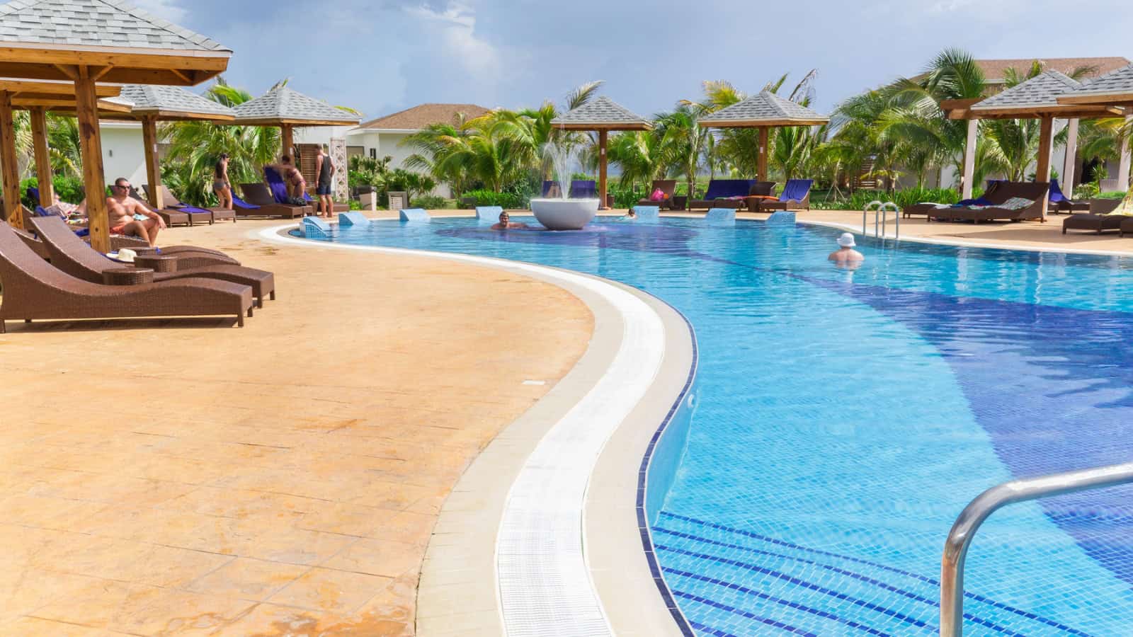 The Hidden Downside To Booking the Cheapest All-Inclusive Deals 1 Nice view of comfortable cozy curved swimming pool