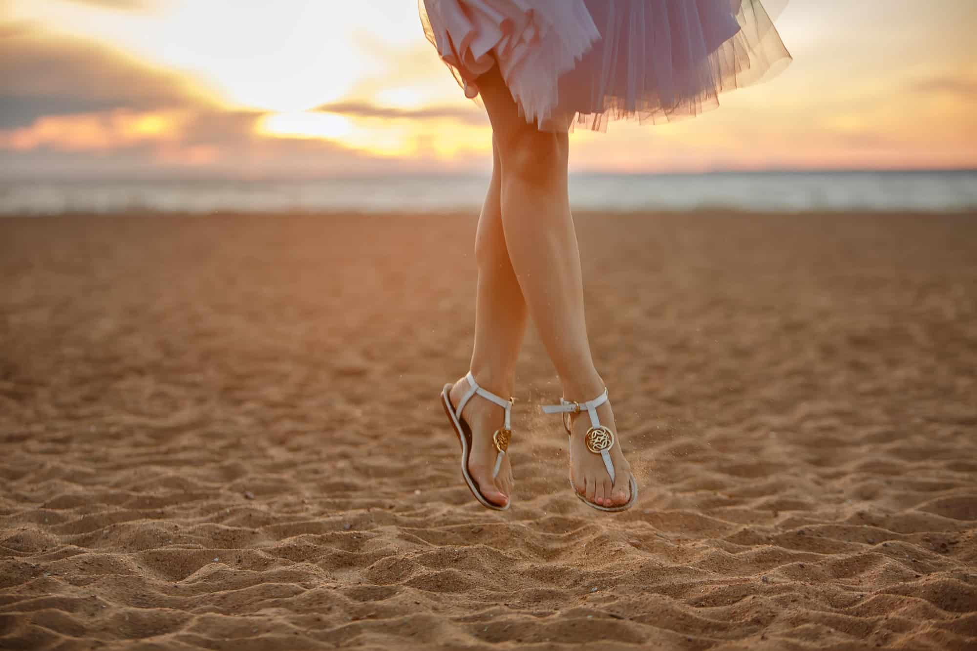 Master Packing for Paradise With These 15 Tips 8 Photo of woman's feet in sandals