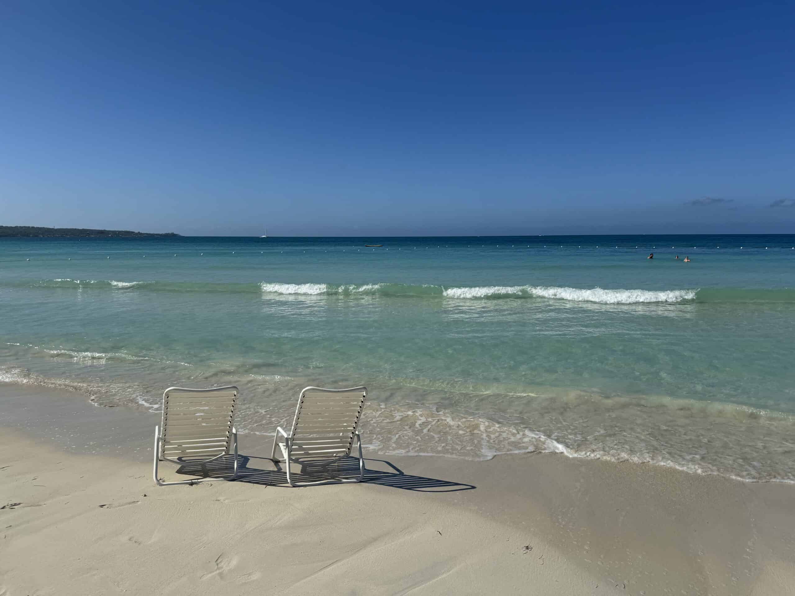 sunbeds on the beach near the water
