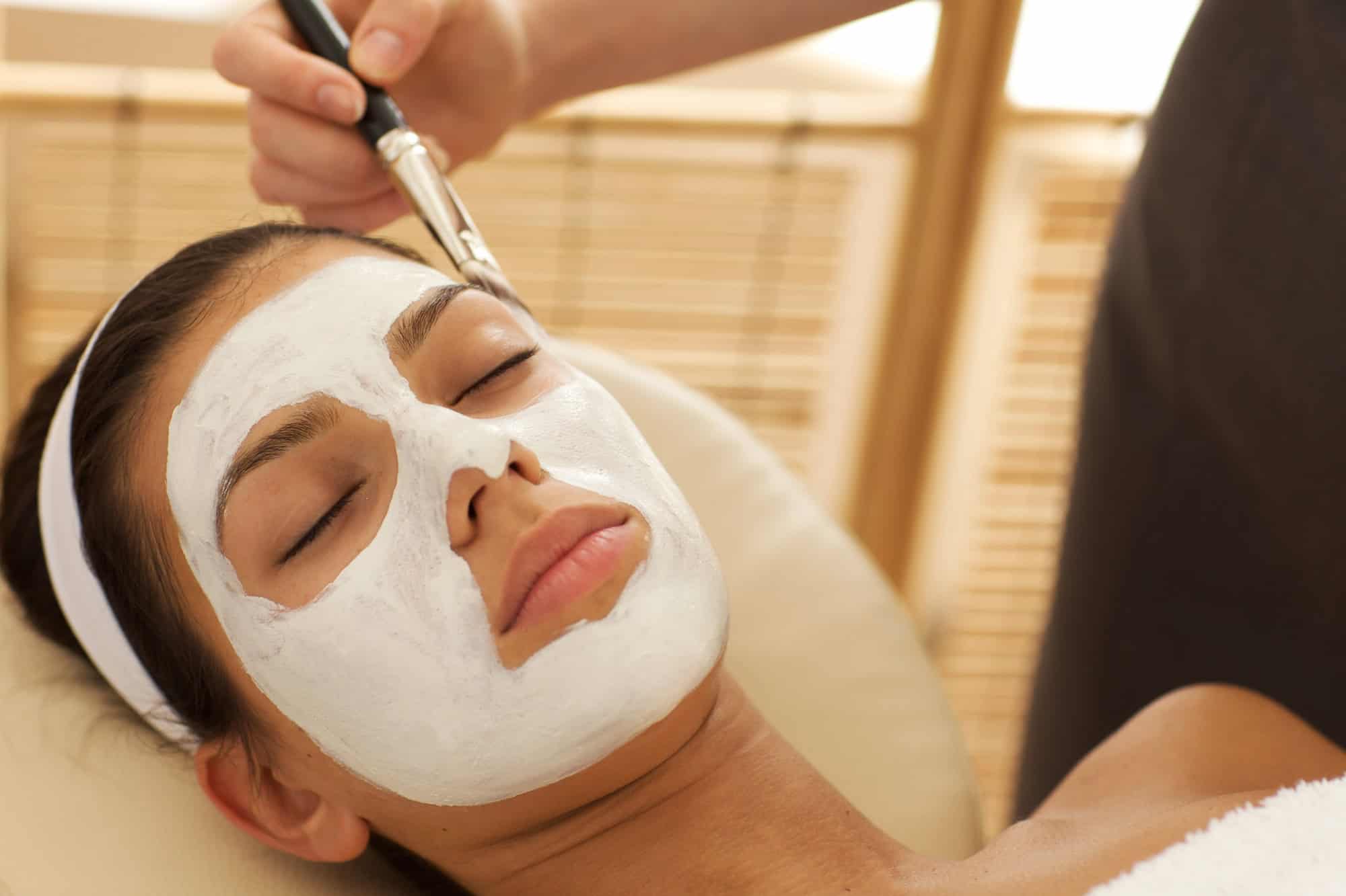 Here’s How Much Money People Spend on Spa Services at All-Inclusive Resorts 2 Close-up of young woman receiving beauty treatment in spa