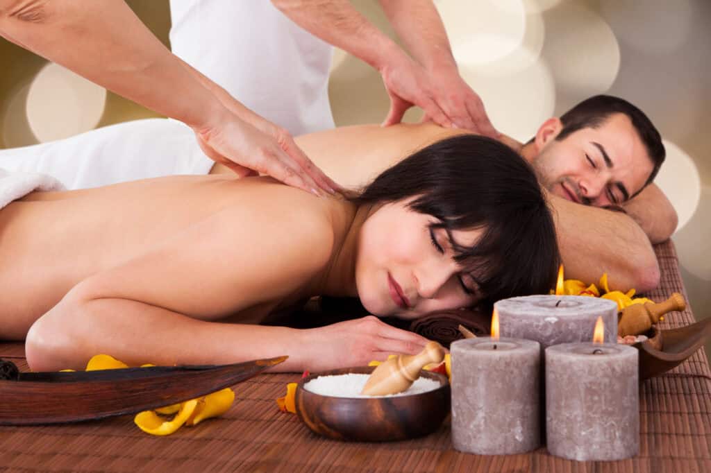 Relaxed Couple Receiving Back Massage