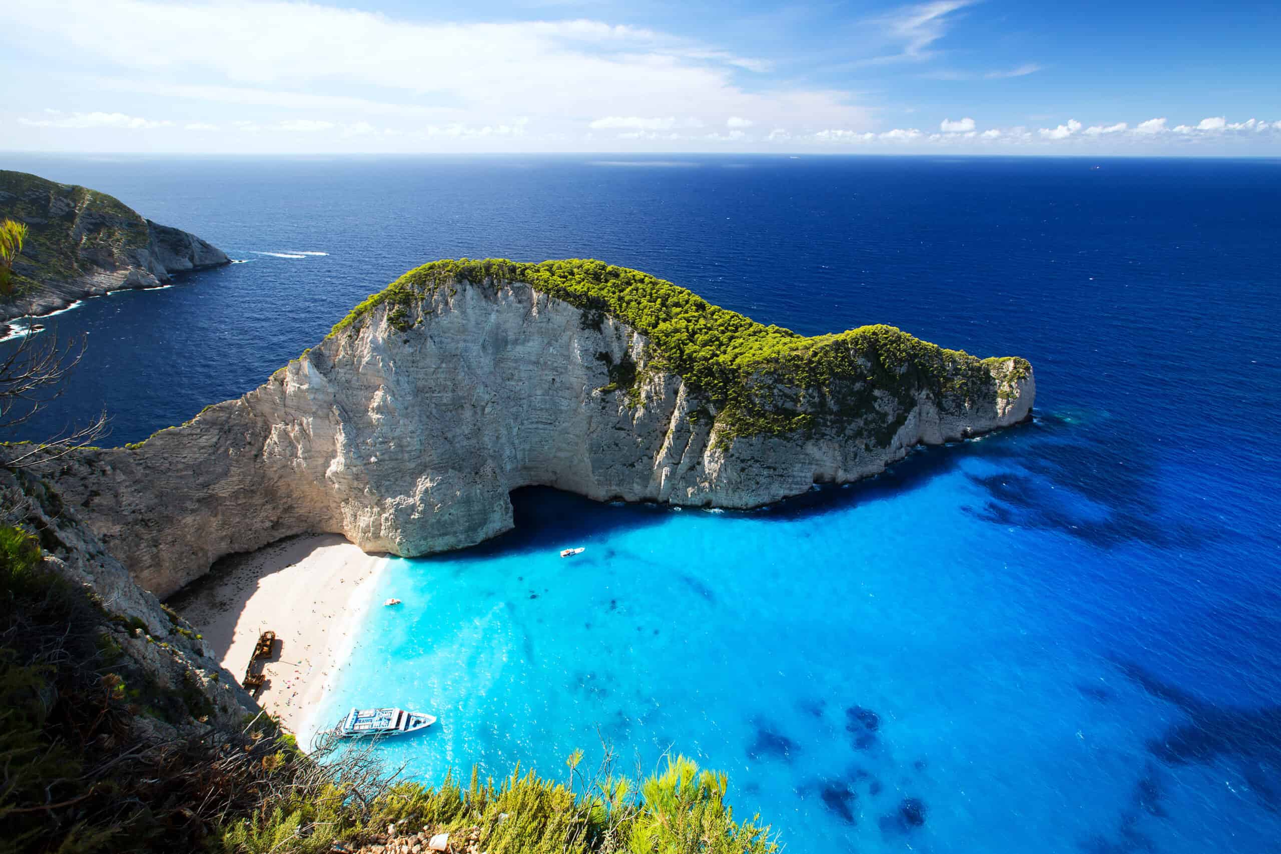 20 Hidden Beaches With the Bluest Waters You Won’t Believe Exist 1 Navagio Beach, Zakynthos, Greece