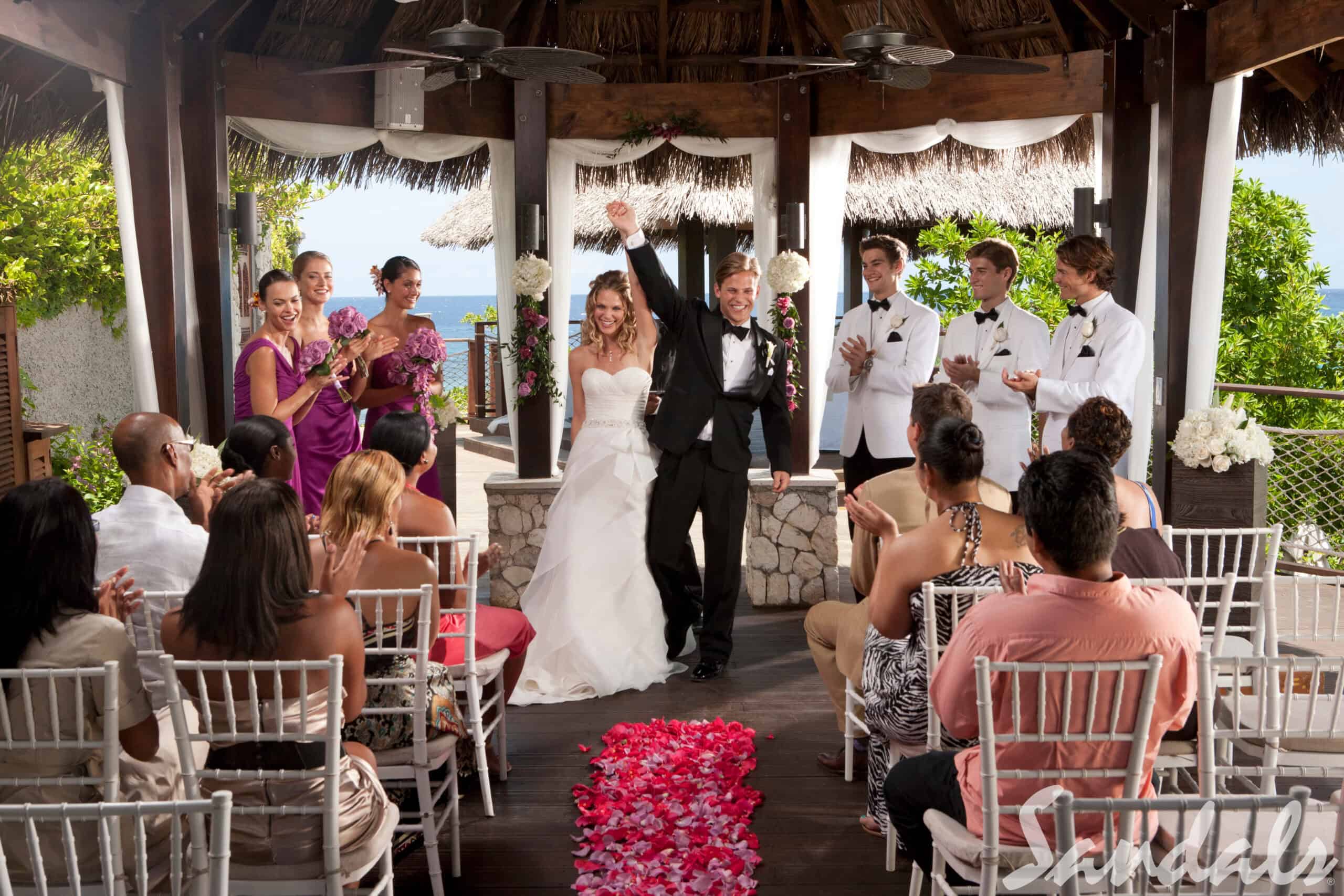 Here’s How Much Money People Spend on Destination Weddings at All-inclusive Resorts 11 Wedding beachclub at Sandals Ochi